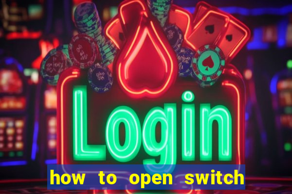 how to open switch oled game card slot